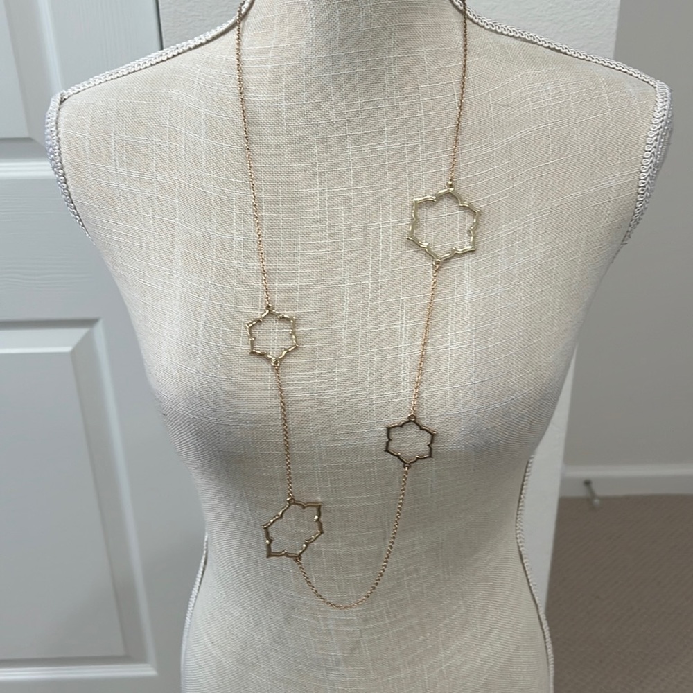 Gold plated magnolia long necklace in perfect condition. Length adjustable